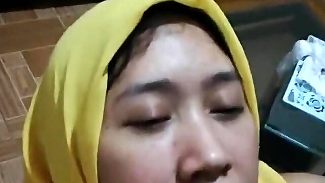 Indonesian Yellow Hijab Takes Big Facial Cum From Small Cock