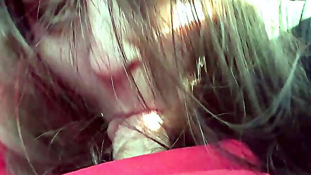 MILF plays with cock in the car