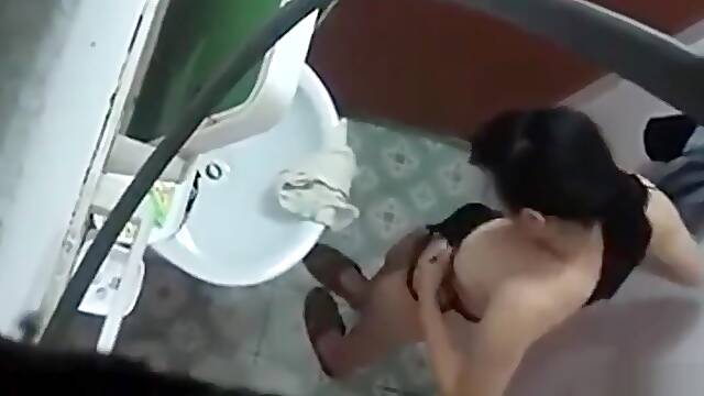 Asian Stepmom spied while showering