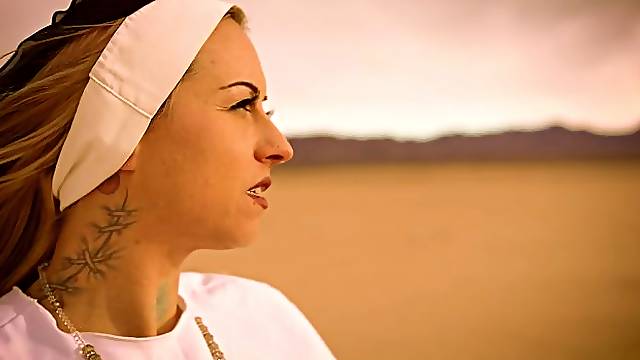 Slutty nun Ivizia Dakini shows off her gorgeous body in the desert