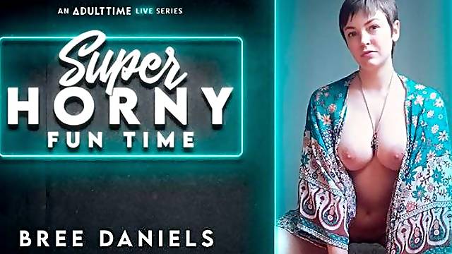 Big-tit redhead hottie Bree Daniels undresses and grabs her sex tool