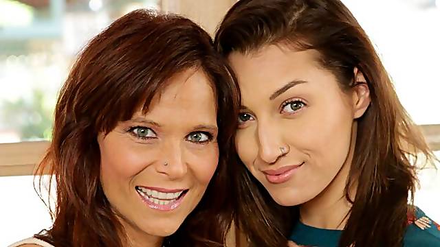 Syren De Mer and Bella Rolland are having fun in the bedroom