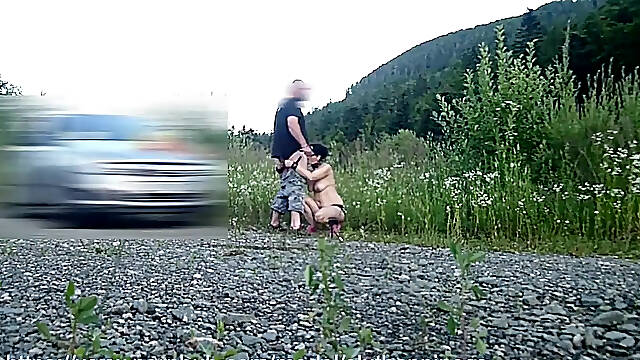 Curvy milf gives blowjob to her dominant husband in the forest