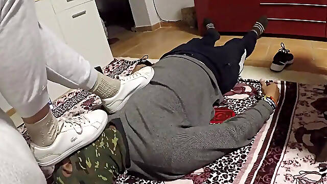 Mom teaches slave to worship her nylon feet