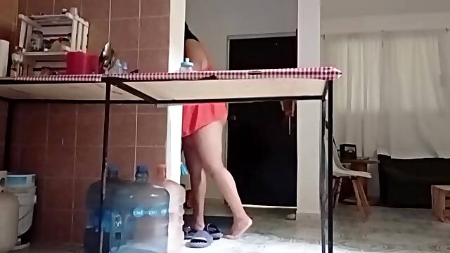 Chubby Mexican MILF gives a sloppy blowjob in the kitchen