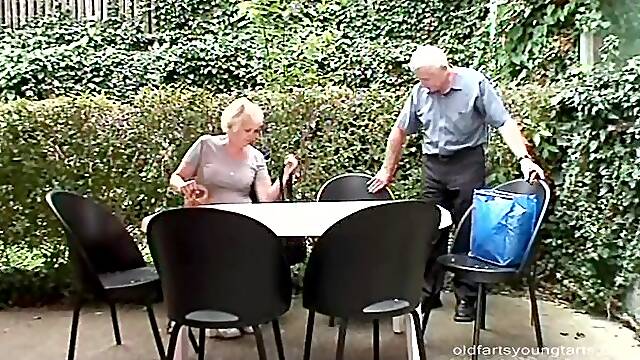 Senior citizens on a picnic are joined by a cutie for a threesome