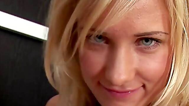 A hungry blonde with beautiful blue eyes sucks and strokes him