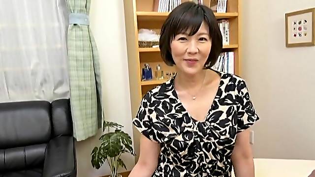 Asian mature Enshiro Hitomi enjoys playing with a large toy