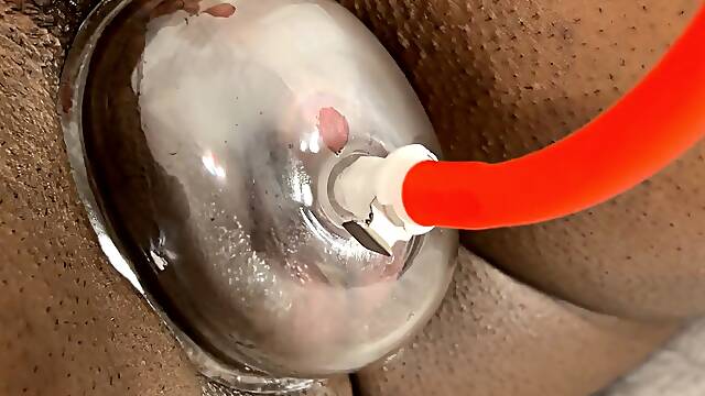 Spouse uses cunt pump on Black Muscle wifes MASSIVE CLITORIS!!