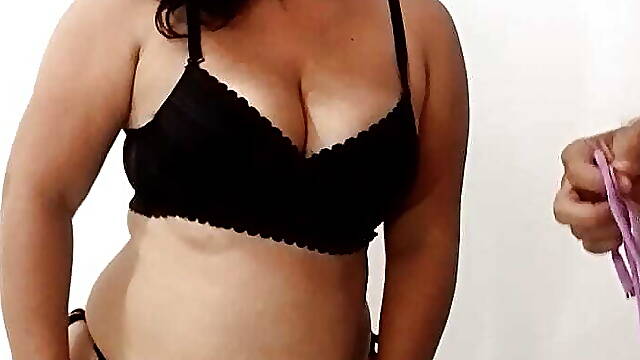 Bride in black lingerie sucking delicious