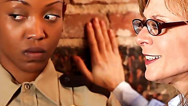 A sexy black girl is caught and disciplined by two white female officers