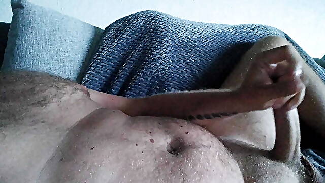 Nice jerk and cumshot in the livingroom