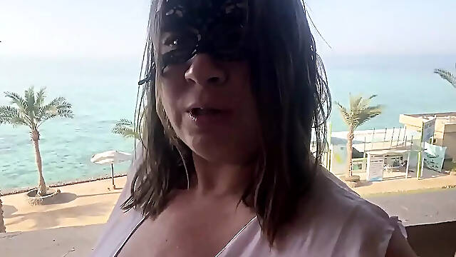Hairy Pussy on the Outdoor Balcony Masturbates and Orgasms with Squirting.