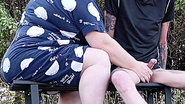 Stepmom in a public park fingering my dick on a bench