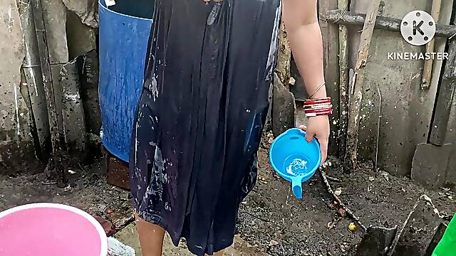 Mature likes to pour water on herself with clothes on