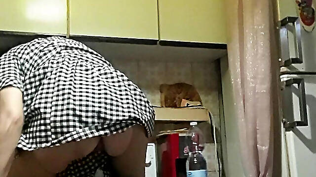 Housewife in the Kitchen with Brush in Pussy
