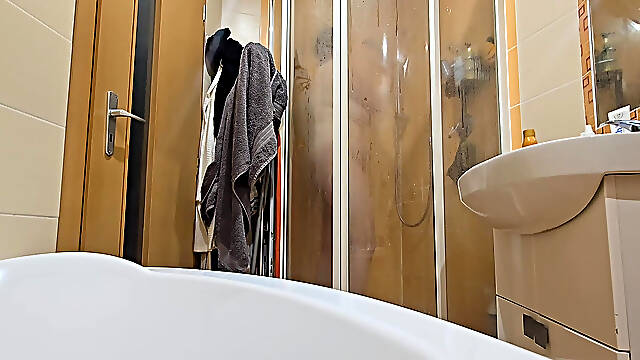 A Busty BBW Showering in the Shower Cabin, Shaving Her Armpits, Pussy, and Legs.