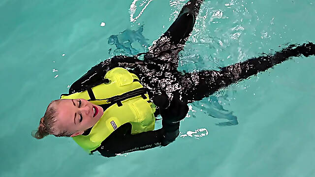 Neoprene Lust: Inflatable Snorkel Vest Pleasure in the Pool